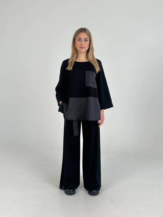 Pantaloni ampi a vita alta con cintura