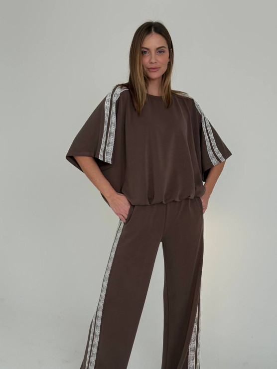 Pantaloni morbidi con bande decorative