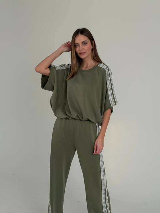 Soft trousers with decorative side bands