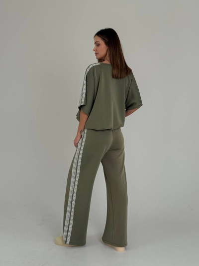 Soft trousers with decorative side bands