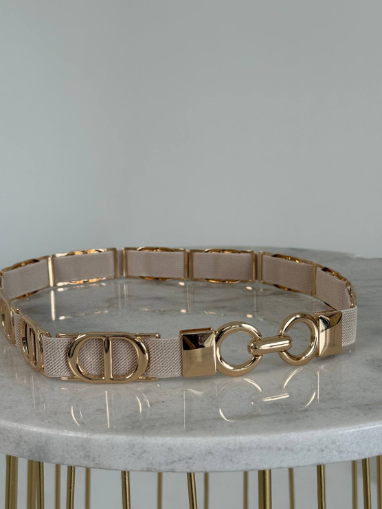 Elastic belt with metal rings