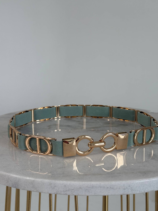 Elastic belt with metal rings