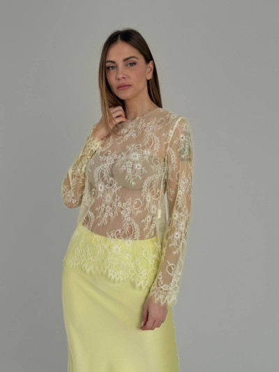 Blusa in pizzo trasparente