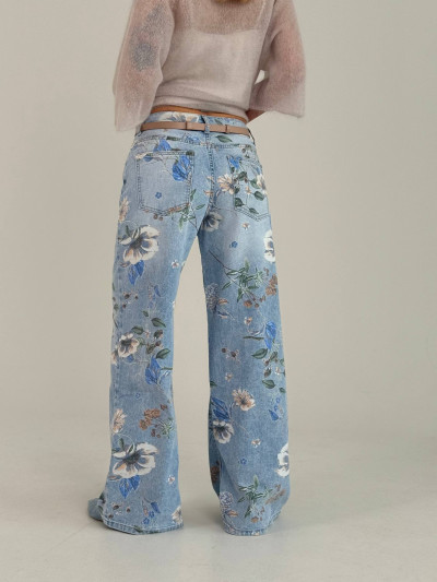 Jeans floreali a gamba ampia
