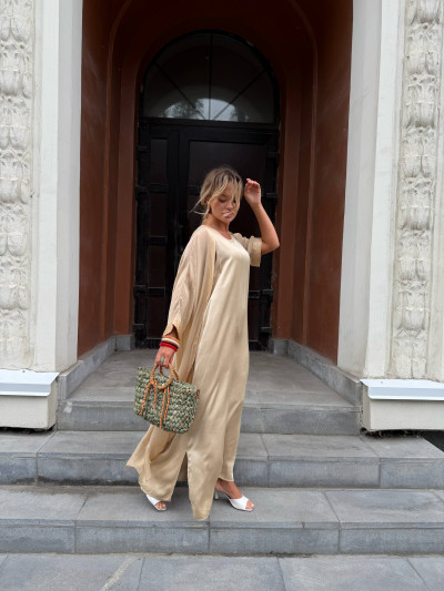 Sleeveless dress with side slits