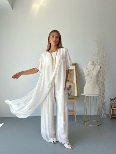 Blusa asimmetrica in misto seta