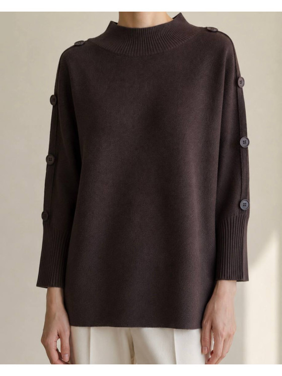 Oversized sweater with sleeve buttons