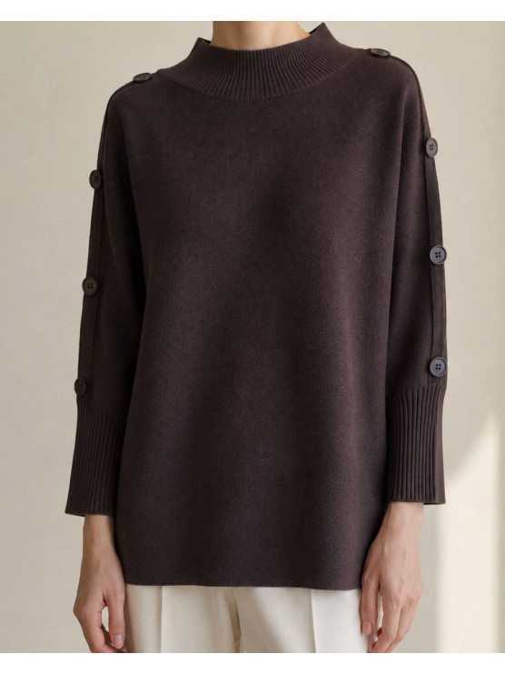 Maglia oversize con bottoni sulle...