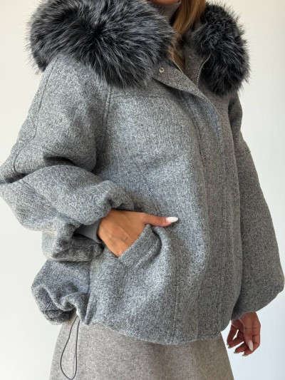 Giacca oversize con cappuccio in eco pelliccia