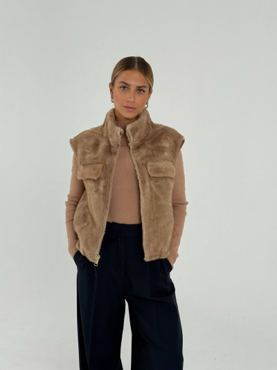 Reversible vest with faux fur interior