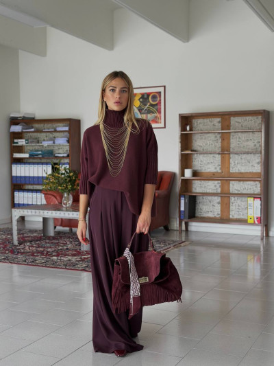 Pantaloni ampi con pieghe decorative