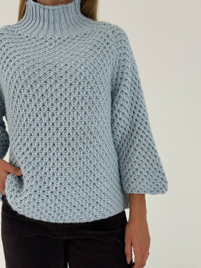 Pullover ampio in maglia lavorata con collo alto