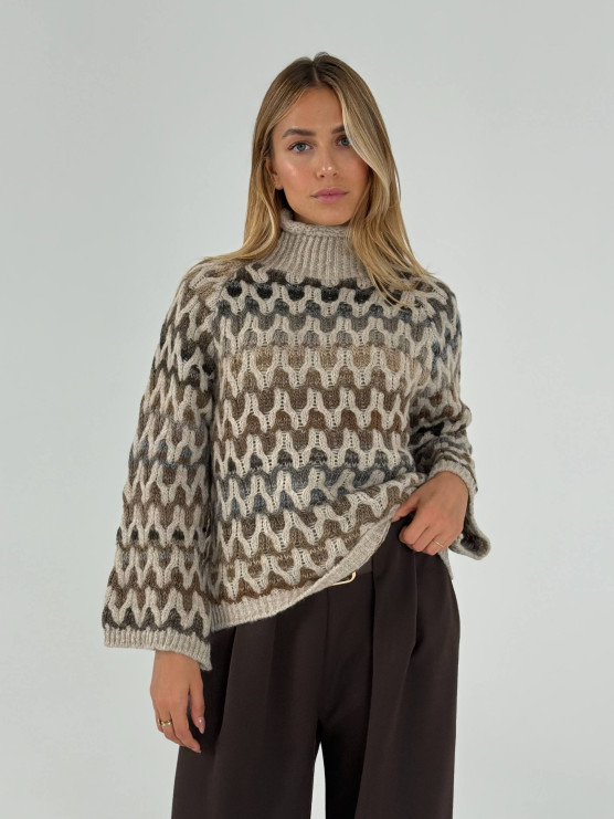 Pullover collo alto con lavorazione...