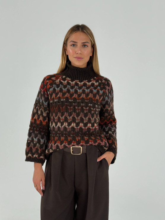 Pullover collo alto con lavorazione...