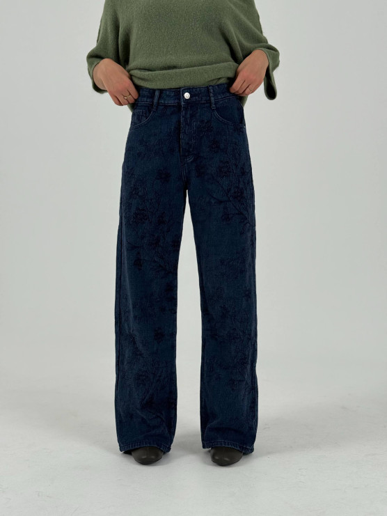Jeans a gamba ampia con ricami floreali